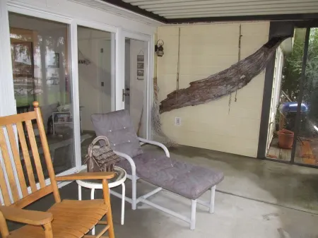 Pappy's Pool Lake: A Lakeside House with Pier, Private Boat Ramp, Screened porch