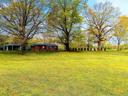 Tiny home cabin by the pond
