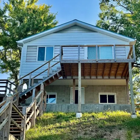 Cottage right on the AuSable River in charming Mio