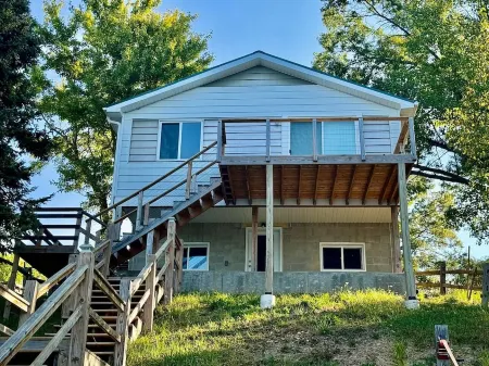 Cottage right on the AuSable River in charming Mio