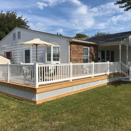 Beautiful corner property with cozy beach vibe.