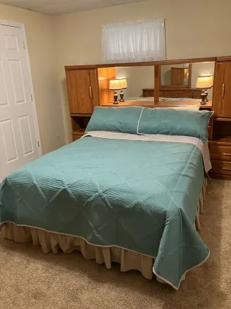 Gound level and private home with 142 feet of river front access.