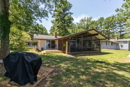 Quaint waterfront home with private beach