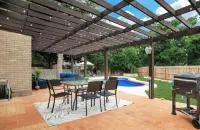 Spacious 5-bedroom house with private pool in a central San Antonio location.