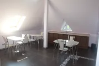 Tayozhnyij Ohotnik Hotel - Inns