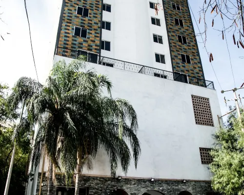 Suites Dioh Hotels near Obispado Museum