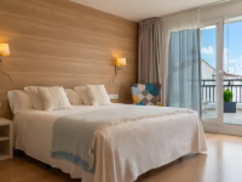 ホスタル メヌルカ シウタデリャのホテル