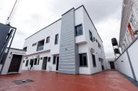 Rhema Apartments Отели в г. 