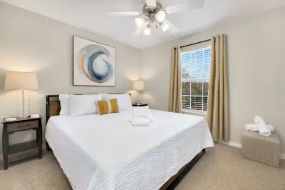 Cozy Patio and Open Living Space Await - Charming Townhome Hotels near Bud Walton Arena