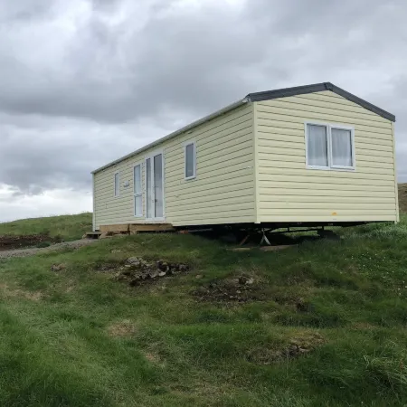 Lækjarkot Rooms and Cottages with Kitchen