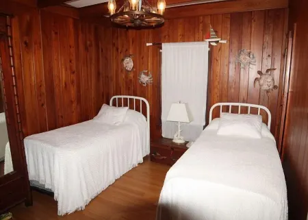 Ocean Front Vacation Home with a Large Screened-in Patio by RedAwning