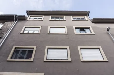 The Queen Luxury Apartments - Villa Giorgia Hotels near Documentation Center on Migration (CDMH)