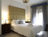 Hospedarte Palacete Real Hotels in El Rocio