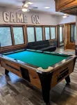 Hot Tub and Game Room! Center of Town, Walking Distance to Ball Games & College.