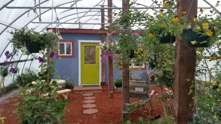 Cottage In A Greenhouse