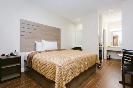 Scottish Inn & Suites Отели в г. Бейтаун