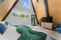 NEW! 2-bedroom A-frame Cabin with Sauna, Hot Tub, & Creekfront