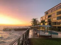 Beachfront 2-bedroom condo in St Lawrence Gap near Oistins Hotels in Dover