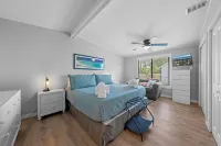 Cozy Canal Escape! Screen Covered Pool, Sunroom, Sun Deck, & Floating Boat Dock - 4-Star