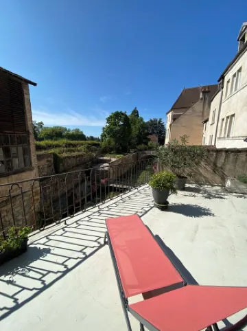 Historic house on rue Pasteur with terrace overlooking Dole's Little Venice