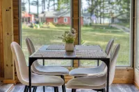 Charming Green Cabin with Private Round Lake Access, Minutes from Ludington