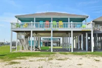 Just steps to the Sand & Surf!  Sleeps 12, with 2 Master Suites! Perfect Rental!