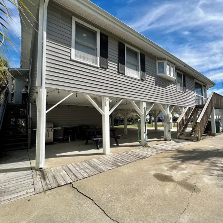 Palmetto Dream is a 4-bedroom 2.5 bath house located on 2nd Row with Great Views