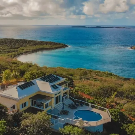 Home with panoramic views with access to private beach!
