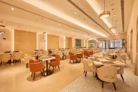 Skywings Sarovar Portico Mathura - فطور