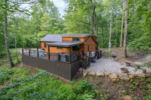 The Mighty Acorn, Bungalow is a delightful cozy tiny home in the woods.