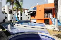Capital O Hotel Partidor Del Sol, Oaxtepec - parkir