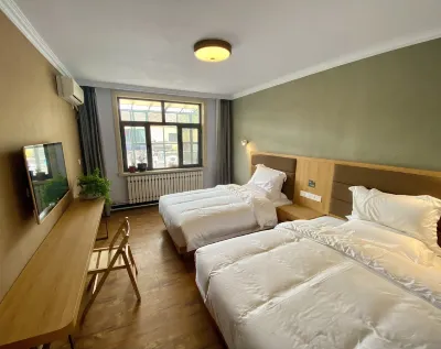 Jinchen Lanting Homestay (Bayan Gaole Road) Hotels near Baima Cultural Park