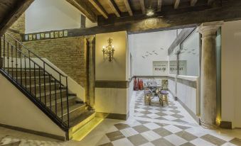 Apartamentos Real Suites Realejo - Housity