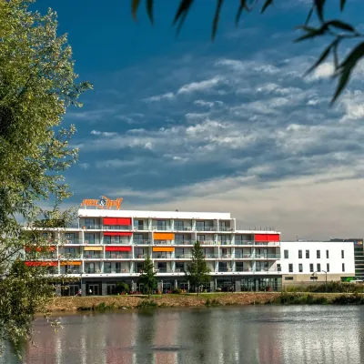 Appart-Hôtel Mer & Golf City Bordeaux - Bruges Отели рядом с достопримечательностью «Старый город»