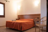 Residence Cala Viola Hotels in Orosei