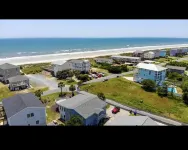 SAND SHACK- Steps away from the Sand