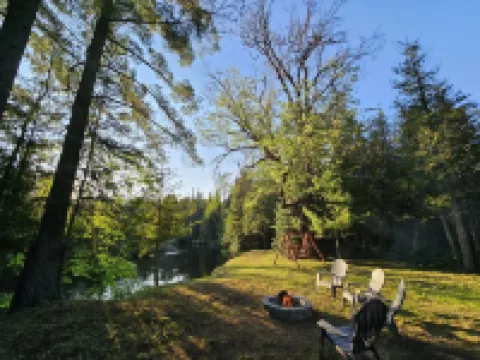 Cozy camping retreat on the banks of the beautiful AuSable River Hotels in Grayling Township