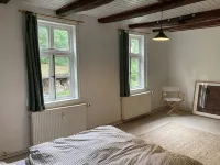 Stylish and bright apartment in a listed half-timbered house with a large garden