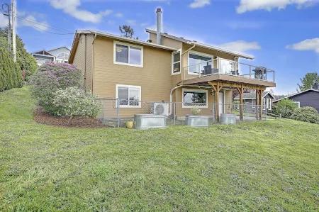 Pristine modern home with sweeping water views