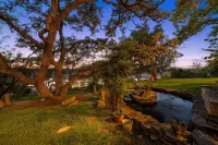 SPECTACULAR LAKEFRONT OASISOver 400 feet frontage on 2 acres of century oaks
