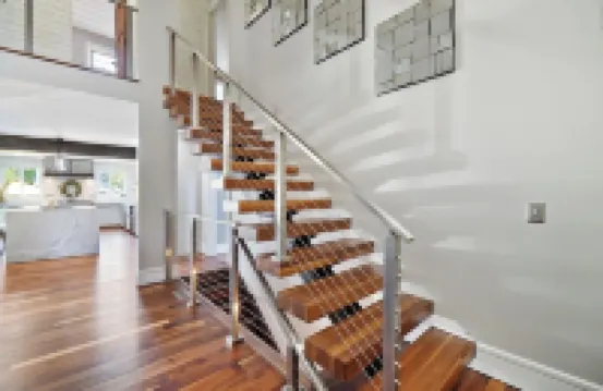 High-end home w/ fireplace, gourmet kitchen, sauna, game rm/ large yard/fire pit