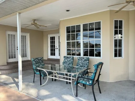 Relax at Southern Exposure in Auburndale with a Pool & 76 Acre Private Lake.