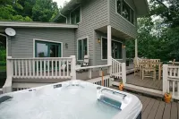 Modern Lodge close to Asheville NC with mountain views, hot tub & fire pit.