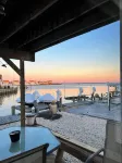Steps from the beach! Come sail away!