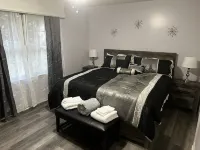 Cozy updated home with luxury bathrooms and kitchen located 5 minutes from post