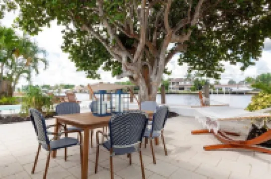 Beautiful Waterfront Condo on Canal with Pool & Walk to Beach! Boat Watch! 2b/2b