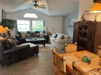 Hidden in the trees!Reasonable Rates-Sleeps 12-Includes kayak for 4.New listing!