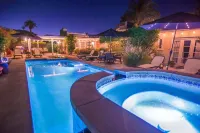 Steps to El Paseo ~ Chic Art Deco Retreat with Pool