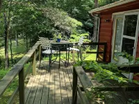 Our creekside cabin is nestled deep in the country on a secluded lane.
