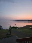 Rustic cabin getaway on the shore of Soo Lake in Phillips, WI